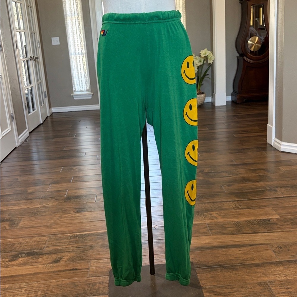 Green Sweatpants with Yellow Smiley Faces